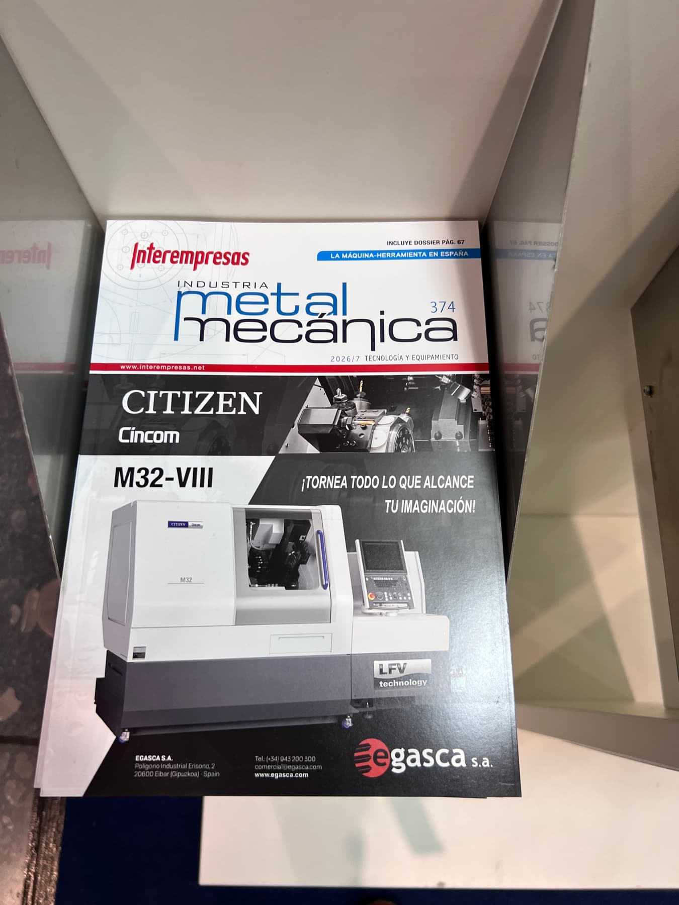 Metalworking exhibition signage and a machining display photographed at AMB Stuttgart 2026